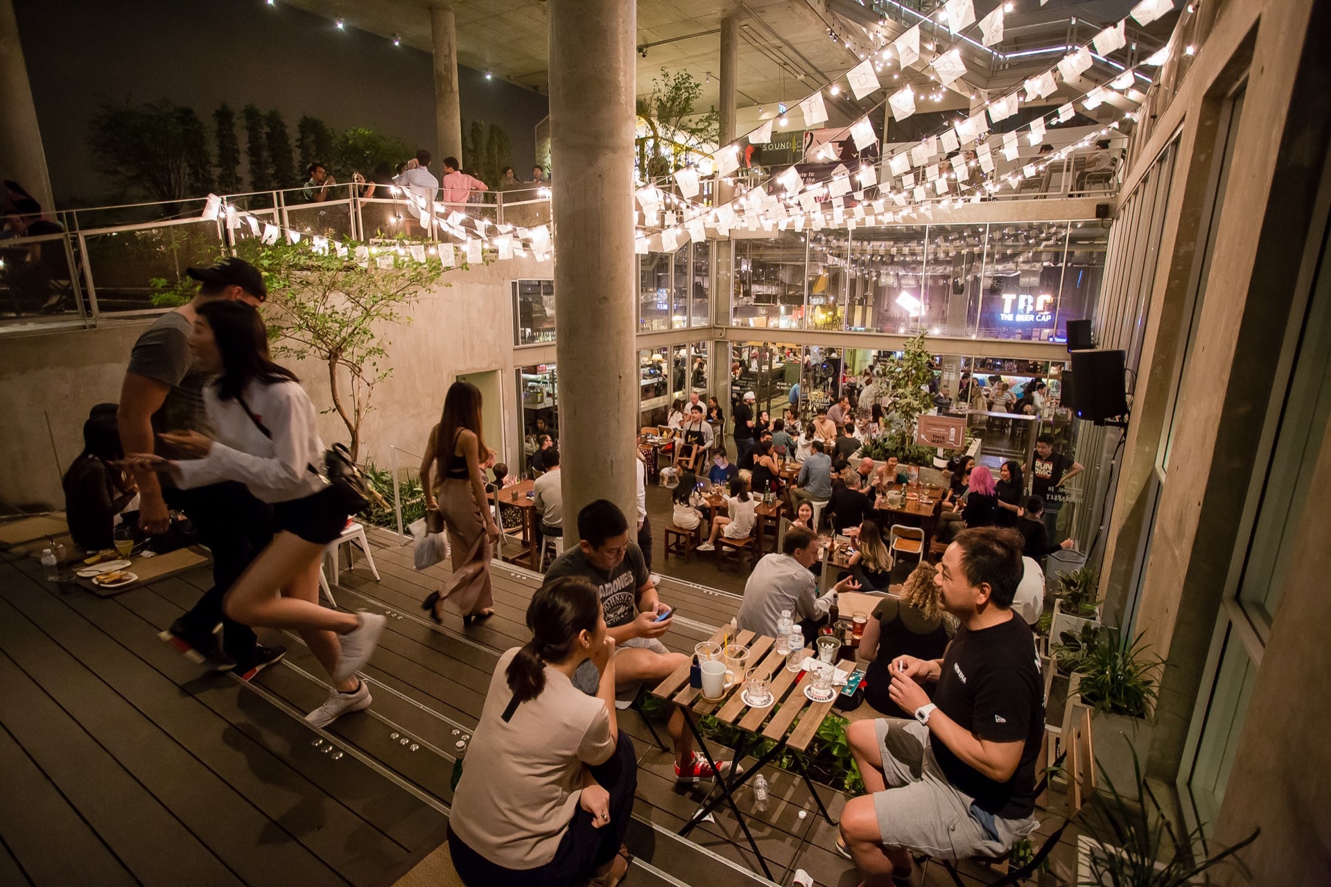 The Beer Cap seen across the stepped seating at The Commons Thonglor